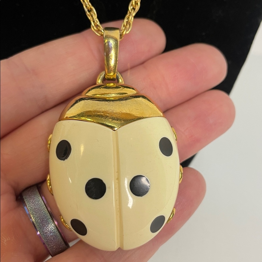 Crown Trifari Cream Resin Ladybug Pendant on 28” Gold Tone Chain